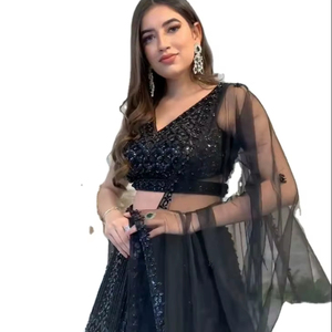 SIE présente un ensemble Chnaiya Choli / Lahenga noir très élégant, orné de motifs multi-codifiés et de sequins, idéal pour les défilés et les événements. - Product Image 1