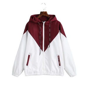 Chaqueta con capucha unisex IBRATEX al por mayor, rosa y blanca con bloques de color, ligera, informal, cortavientos con cordón - Product Image 2