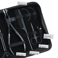 Kit complet d'outils pour extensions capillaires : crochet de tirage, pinces pour extensions adhésives, peigne à queue, aiguilles courbées, outil de retrait de micro-perles, pince à sertir