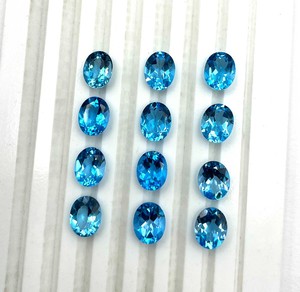 พลอยบลูโทแพซธรรมชาติทรงรีขนาด 6 มม. 9 มม. แบบเจียระไน พลอยบลูโทแพซสีฟ้าสวิสแบบเม็ดเดี่ยว ขนาดปรับเทียบได้ ขายส่งจำนวนมาก - Product Image 6