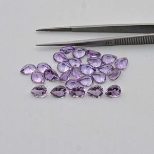 ลูกแพร์เจียระไนแบบเหลี่ยมเพชรพลอยสีชมพูอเมทิสต์ธรรมชาติเกรด AAA 3x4mm-10x14mm อัญมณีหลวม - Product Image 1