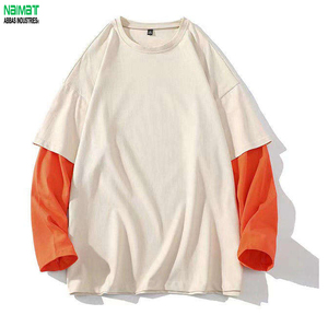 T-shirt à manches longues surdimensionné pour homme, en coton tricoté contrastant orange, col rond, design décontracté à blocs de couleur unie - Product Image 1