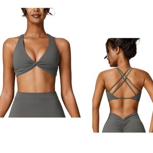 Sujetador deportivo transpirable y elástico para mujer con logo personalizado, diseño cruzado, ideal para yoga, fitness y gimnasio, venta al por mayor. - Product Image 1