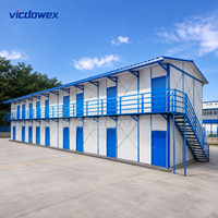 VICDOWEX Maison préfabriquée de type K à assemblage rapide, panneau sandwich en acier, design modulaire contemporain pour projets de bureaux et utilisation en campement