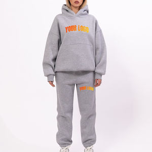 Conjunto deportivo de mujer OEM/ODM 100% algodón, corte holgado, sudadera con hombros caídos y pantalones, logotipo personalizado con impresión DTF, chándal para mujer - Product Image 1