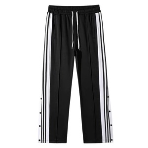 Pantalon de survêtement noir pour homme avec bandes blanches, taille élastique et cordon de serrage, décontracté, respirant, en tissu tricoté mi-lourd, idéal pour l'automne - Product Image 1