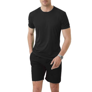 Conjunto deportivo de algodón para hombre, camiseta de manga corta de color sólido y pantalones cortos para verano, ideal para entrenamiento en el gimnasio. - Product Image 1