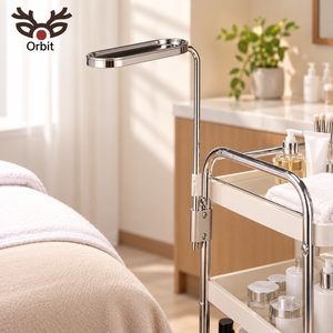 Chariot de manucure moderne Orbit en acier inoxydable avec plateau rotatif et dessus en plastique - Product Image 1