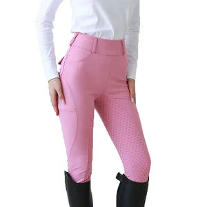 Culottes d'équitation rose vif pour femmes avec logo personnalisé, extensibles dans quatre directions (Spandex/Nylon), pour sports de plein air, avec ceintures ajustables - Product Image 1