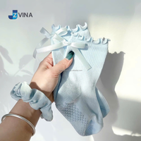 Chaussettes personnalisées à nœud en couleurs pastel mignonnes pour femmes, idéales pour le Pilates, le Yoga et la Barre, vente en gros sur mesure, usine JZVINA au Vietnam