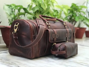 กระเป๋าเดินทางหนังแท้คุณภาพส่งออก สไตล์วินเทจ สำหรับวันหยุดสุดสัปดาห์  แบบ unisex น้ำหนักเบา ความจุมาก พร้อมซิป ขายส่ง - Product Image 3