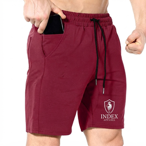 Pantalones cortos Bermuda color granate para hombre de Index Apparel con cordón ajustable y bolsillos, de secado rápido y corte casual. - Product Image 1