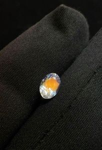 orange fire natural faceted <b>rainbow</b> moonstone oval cut. - Product Image 3
