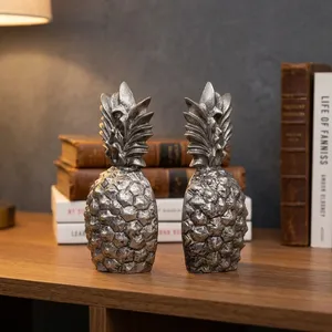 Lot de 2 serre-livres ananas en aluminium argenté antique, sculptures texturées de fruits tropicaux, supports décoratifs en métal - Product Image 6