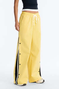 กางเกงขายาวทรงหลวมแบบ unisex ผ้าไนลอน มีกระดุมด้านข้าง รูดเชือกผูกเอว สไตล์ลำลอง สตรีทแวร์ สำหรับผู้ชายและผู้หญิง - Product Image 4