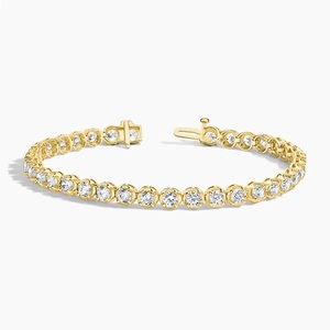 Pulsera de tenis con diamantes de corte redondo y engaste de punta compartida de eternidad completa - Product Image 1