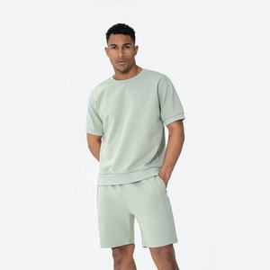 Conjunto doble de verano para hombre Camisetas y pantalones cortos de gran tamaño de algodón para gimnasio con logotipo personalizado Patrón sólido transpirable al por mayor - Product Image 1