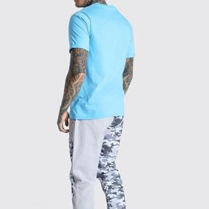 T-shirt pour homme à col rond et manches courtes en toile de coton 100% premium, coupe ample, avec logo personnalisé imprimé en sérigraphie sur le devant, 180 grammes - Product Image 1