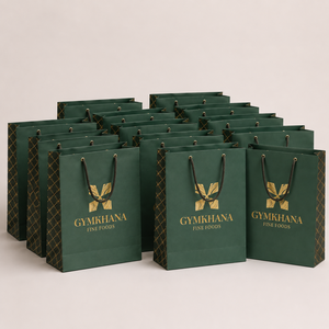 Trending Custom Durable White Paper Carry <b>Bags</b> with Gold Foil Logo and Rope Handles for Premium Retail <b>Gift</b> Boutique Packaging - Product Image 2