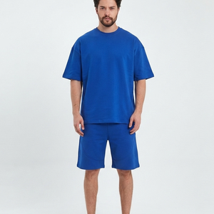 T-shirt Homme Oversize en Coton Bleu Uni à Manches Courtes Col Rond Coupe Décontractée Respirant Teint Uni Style Épaules Tombantes - Product Image 1