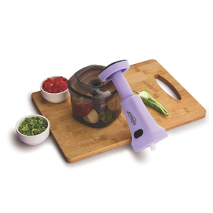 Compact manual food <b>chopper</b> with durable plastic body and sharp stainless steel blades for effortless <b>vegetable</b> and fruit - Product Image 5