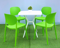 Chaise de jardin en plastique moulé moderne haut de gamme verte, résistante à l'eau, durable, écologique, confortable et empilable pour l'extérieur et la cour