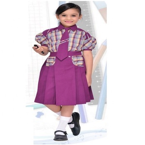 Uniforme escolar para niñas con servicio OEM, vestido de delantal azul combinado con cuadros lisos y logotipo personalizado de fabricante para niños - Product Image 5