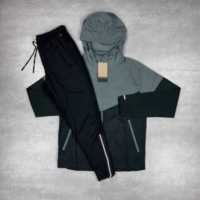 Ensemble de survêtement technique pour homme en tissu premium réfléchissant, coupe-vent, respirant et léger, avec blocs de couleur, idéal pour la course à pied
