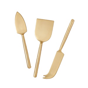 Set di coltelli da formaggio placcati in oro in acciaio inossidabile dal Design moderno con spalmatore di formaggio per affettatrice di formaggi utilizzato per l'hotel di casa del ristorante