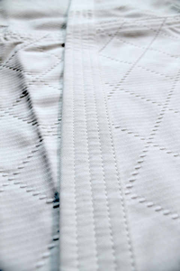 Professional White Karate Gi Set with Premium Quality Material, Reinforced Stitching, and Adjustable Red Belt - Product Image 5