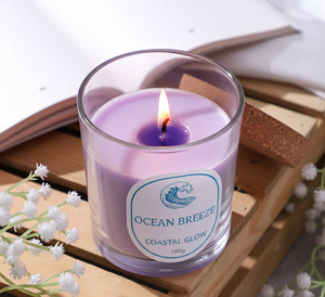 Vela perfumada Ocean Breeze Coastal Glow hecha con cera de primera calidad y vertida en un elegante frasco de vidrio transparente. - Product Image 1