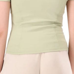 Haut ajusté vert clair à manches courtes et col montant pour femme, avec demi-fermeture éclair sur le devant, coupe slim, chemise décontractée basique extensible, vêtement de mode quotidien - Product Image 5