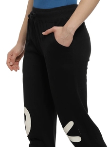 Pantalon de survêtement noir pour homme avec taille élastique et cordon de serrage, poches latérales, joggers décontractés en tissu tricoté mi-lourd, idéal pour l'automne - Product Image 1