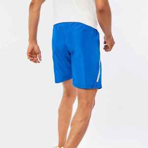 Shorts de sport pour homme, bleu uni, taille mi-haute, avec cordon de serrage, séchage rapide, poches latérales et logo blanc, shorts de course personnalisés - Product Image 4
