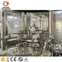 Ligne de production automatique de remplissage, rinçage et bouchage de boissons gazeuses en bouteilles PET pour eau gazeuse