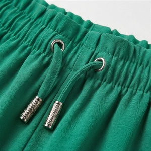 Jupe courte en mousseline de soie verte pour femmes, taille élastique, style décontracté d'été, coupe évasée avec cordon de serrage - Product Image 4