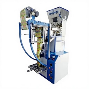 Máquina Empacadora de Bolsas de Plástico Automática Eléctrica de Alta Velocidad DELUXE INDUSTRIES para Frituras y Namkeen, 220V, Capacidad de 10g a 1000g - Product Image 1