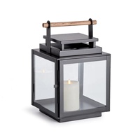 Lanterne à bougie moderne de luxe en métal noir et verre sans plomb avec un design durable pour la décoration de table et de sol à la maison Noël