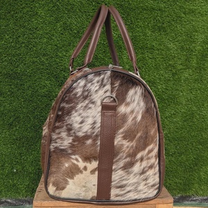 กระเป๋าเดินทางหนังแท้ลายขนสัตว์ ดีไซน์เนอร์ กระเป๋าถือแบบดัฟเฟิลสำหรับวันหยุดสุดสัปดาห์ กระเป๋าเดินทางขึ้นเครื่อง คุณภาพส่งออก OEM LHTB-0116 - Product Image 2