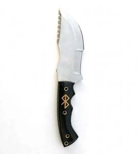 Objeto decorativo con mango de ébano negro, incrustaciones de latón y espina con diseño de dientes de sierra. - Product Image 1