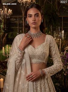 Wedding wear Heavy <b>Net</b> with Pearl & Sequin Embroidered A-Line Ivory Lehenga- Fancy Border Readymade Blouse Set At Wholesale Rate - Product Image 3