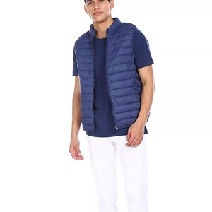 Unisex 100% Nylon Puffer Winter Jacket with Hooded High <b>Neck</b> Zip up Design and Insulated <b>Padding</b> for Warmth in Cold Conditions - Product Image 4