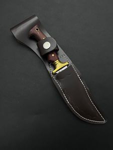 Cuchillo de Caza y Camping de Acero Inoxidable 4116, Hoja Fija con Borde Parcialmente Dentado, Mango de Madera de Paddock y Funda de Cuero - Product Image 6
