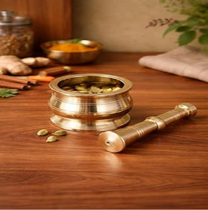 Traditional heavy brass spice <b>grinder</b> set with rimmed bowl and sturdy handle, available at wholesale prices. - Product Image 1
