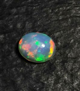 Magnifique opale d'Éthiopie naturelle multicolore, effet feu, cabochon. - Product Image 1