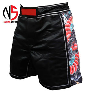 กางเกงมวยไทยคุณภาพพรีเมียมสำหรับผู้ชาย กางเกงมวย MMA สำหรับผู้ใหญ่ กางเกงมวยไทยปักโลโก้ด้านหน้า ระบายอากาศได้ดี แห้งเร็ว ปรับแต่งได้ รุ่นปี 2026 - Product Image 1