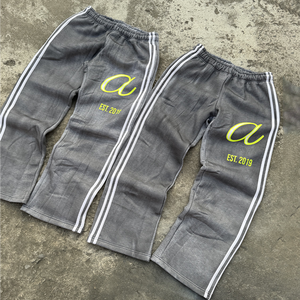 Pantalones Deportivos Vintage Gris Jaspeado, Cintura Elástica, Rayas Laterales, Corte Holgado, Logotipo Serigrafiado, Transpirables, Lavado Desgastado - Product Image 1