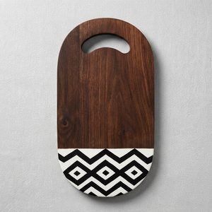Walnut Chopping <b>Board</b> Smooth Oval Profile Strikingly Accented By A <b>Black</b> And White Geometric Base Pattern For Cutting Vegies - Product Image 1