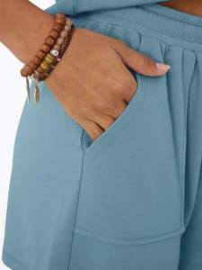 Conjunto de verano para mujer, diseño de cintura atractivo, color azul aguamarina, estilo informal, original, de alta calidad, con cuello en V y jersey. - Product Image 4