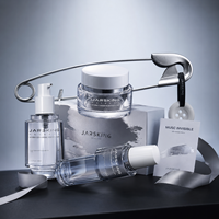 Ensemble d'emballages cosmétiques Glacial Precision 30ml-100ml : Bouteille et pot en verre bleu glace pour ligne d'hydratation haut de gamme Marque privée